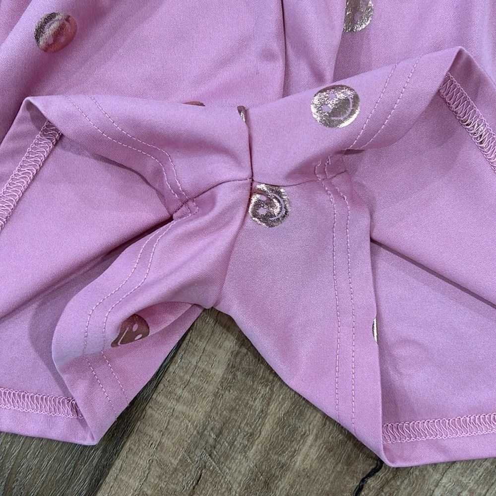 Body glove romper smiley face pink with gold smiles. Size 7 Sleeveless